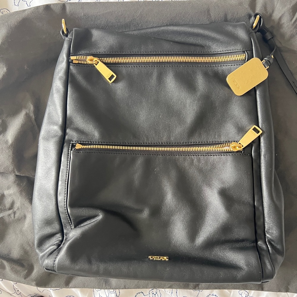 Black Leather Voyageur Backpack tote  Tumi convertible gold accents